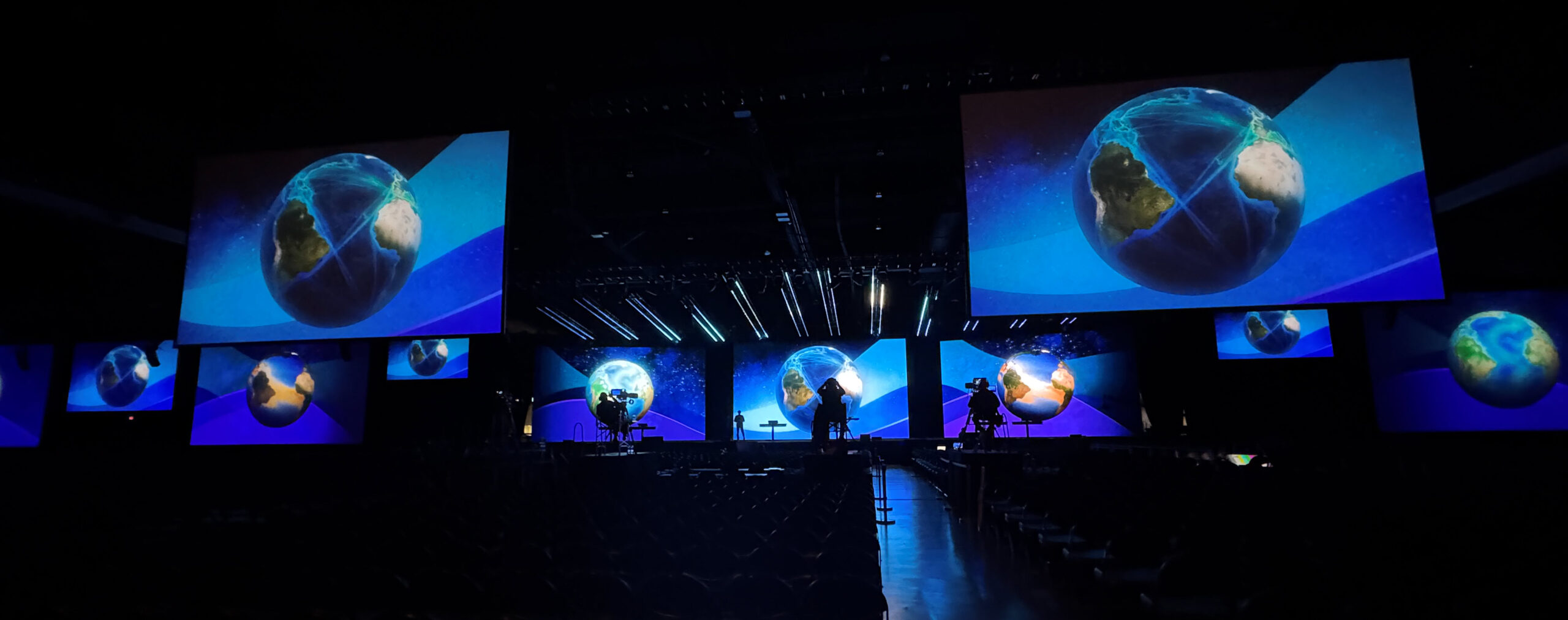 Dress rehearsal at 2026 UC showing animated globes.