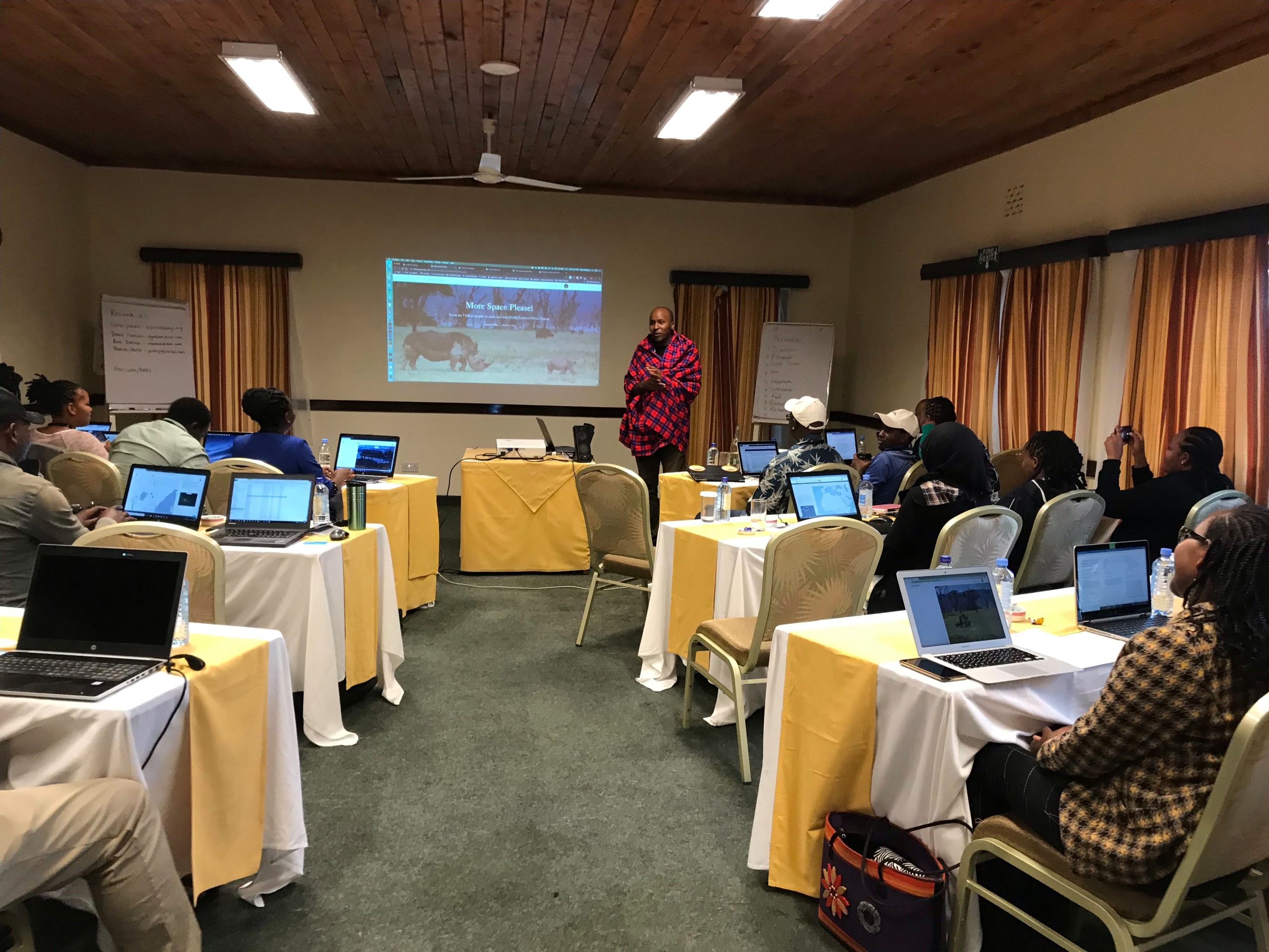 Duncan Ndotono, Communications Officer from the Northern Rangelands Trust presents his story map on Rhinos in the park. Photo: Ross Donihue