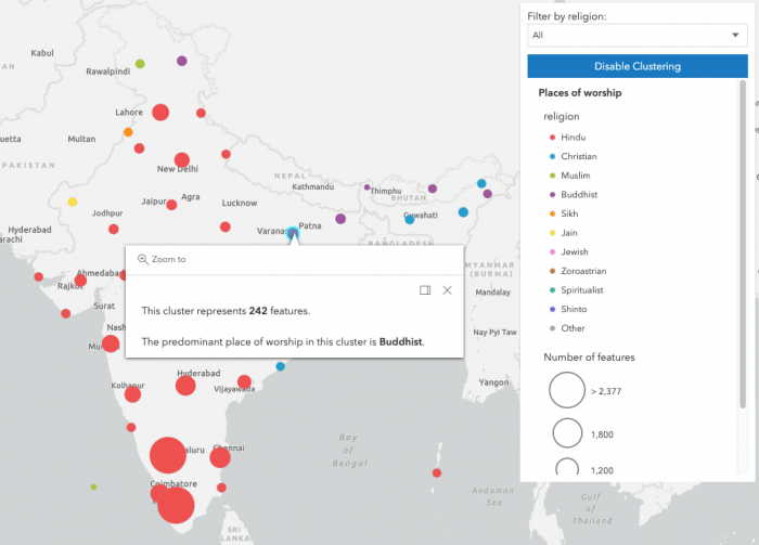 Places of worship in India visualized in clusters. Each point is colored based on the most common religion type in the cluster. An open popup displays this information along with the total number of features inside one of the clusters.