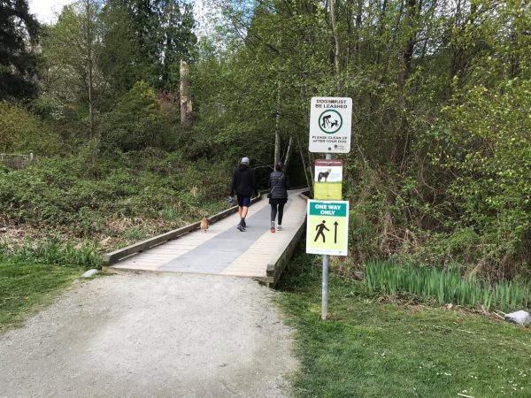 Walking on a park trail in Burnaby Walking on a park trail in Burnaby