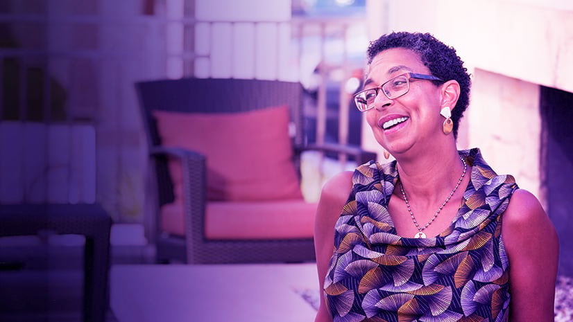 Happy, smiling women in backyard patio.