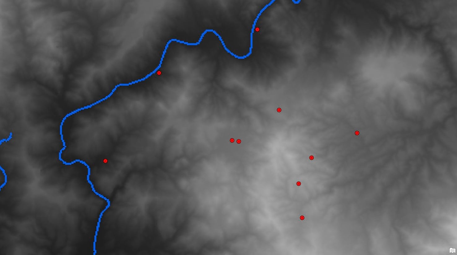 The gray scale raster represents elevation. Lighter the color, higher the elevation. The gray scale raster represents elevation. Lighter the color, higher the elevation.