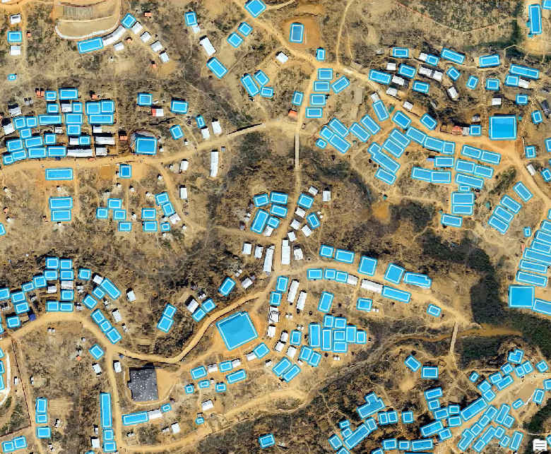 Blue features represent the detected buildings.