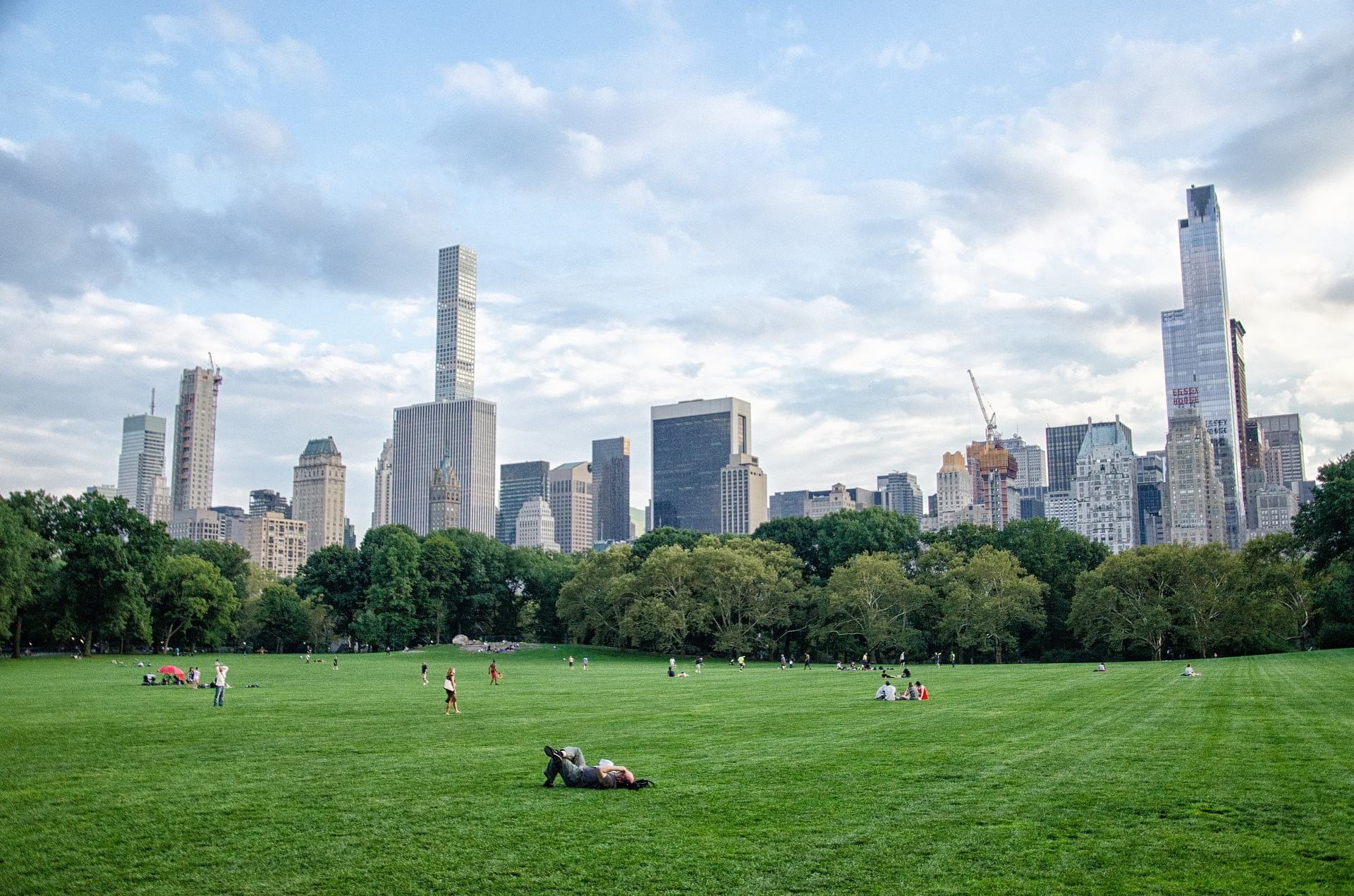 Central Park scene with people relaxing.