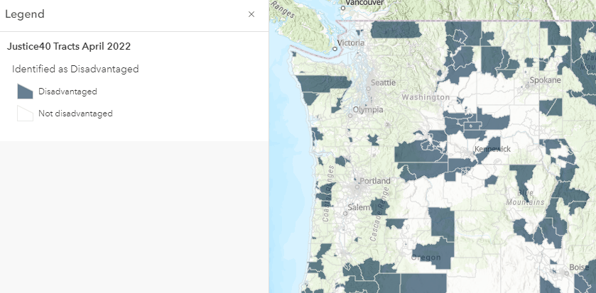 Semi-transparent blue tracts are disadvantaged, hollow tracts are not disadvantaged. Map has the default Topographic basemap.