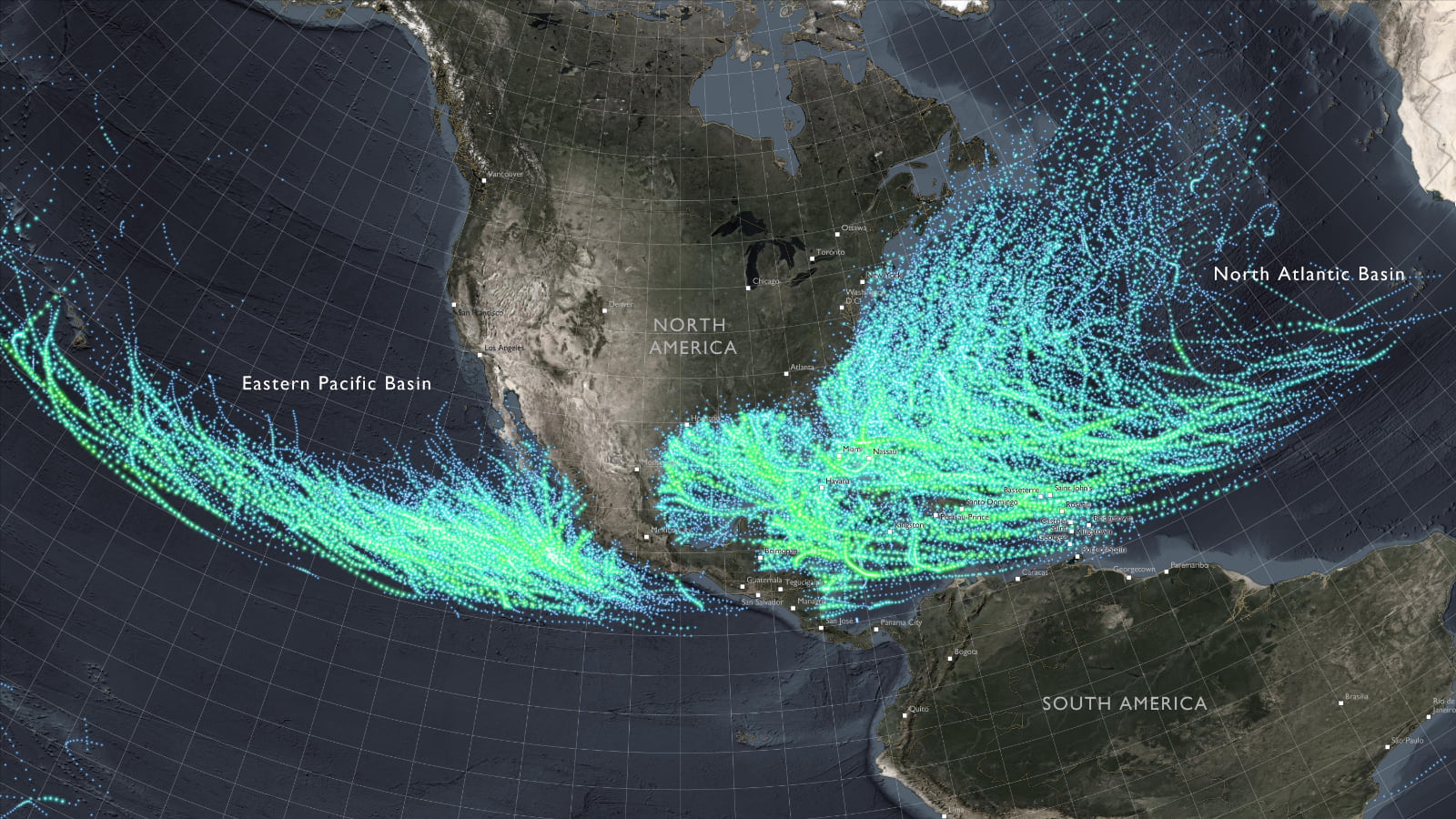 A dark base map of North and South America with bright blue hurricane tracks displayed across the continents and surrounding water