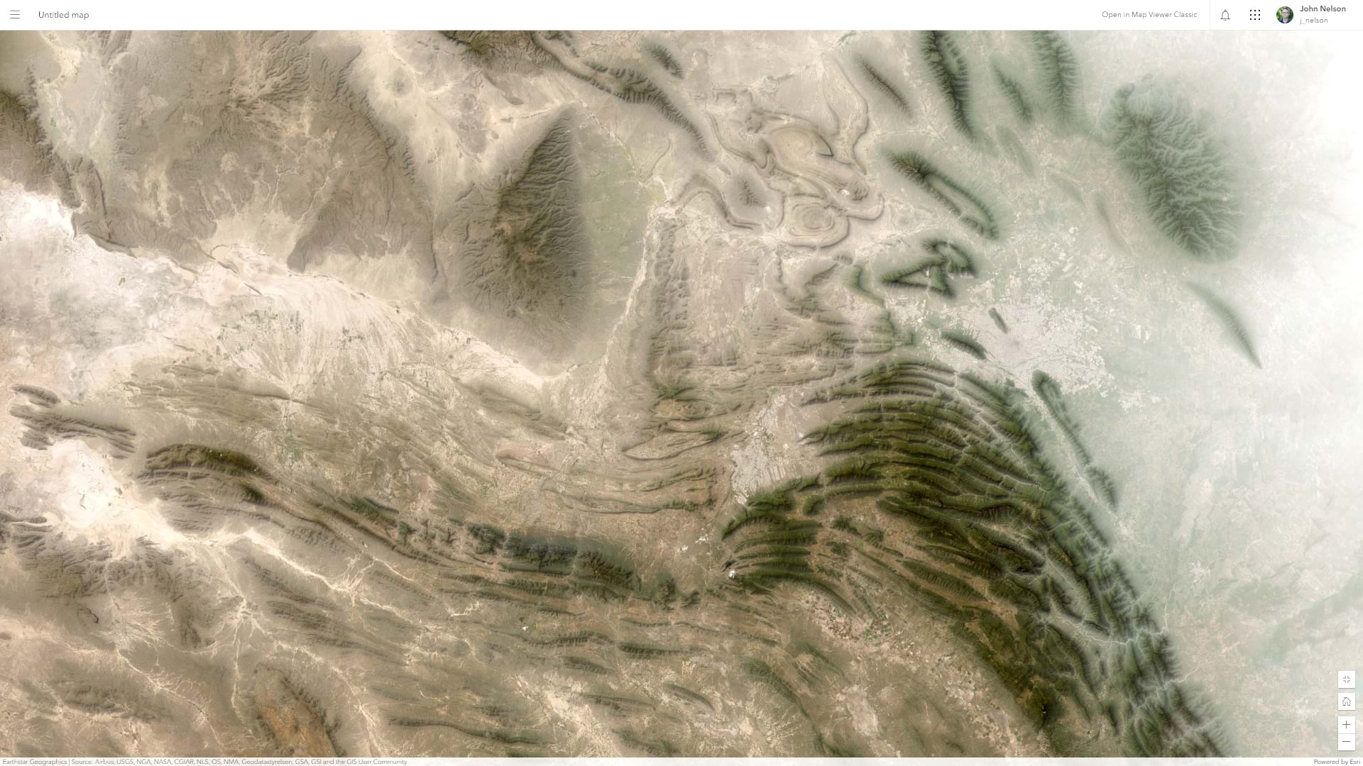 ArcGIs Online imagery basemap shrouded in a handsome mist effect. ArcGIs Online imagery basemap shrouded in a handsome mist effect.