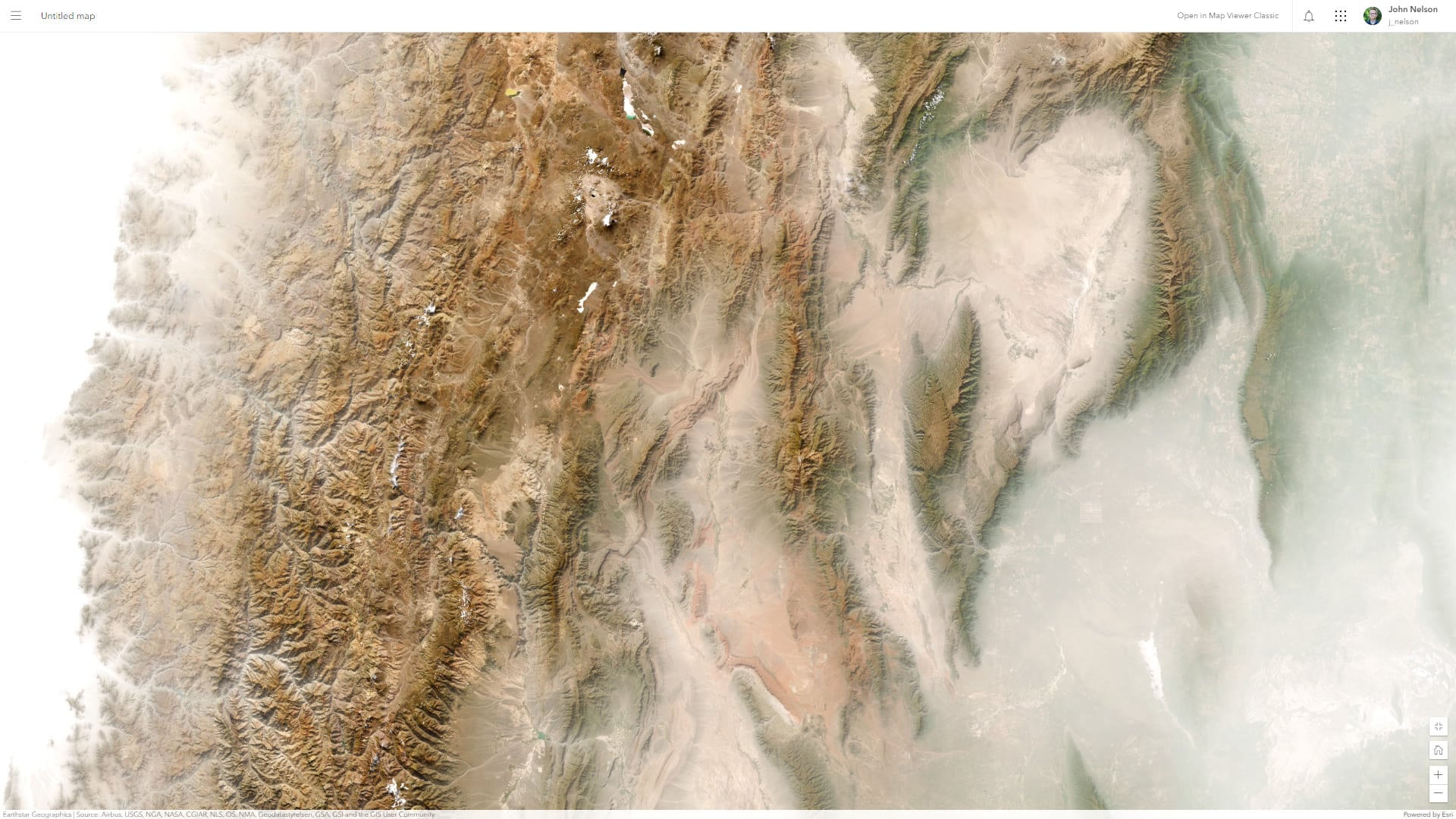 ArcGIs Online imagery basemap blanketed in a ghostly mist effect.
