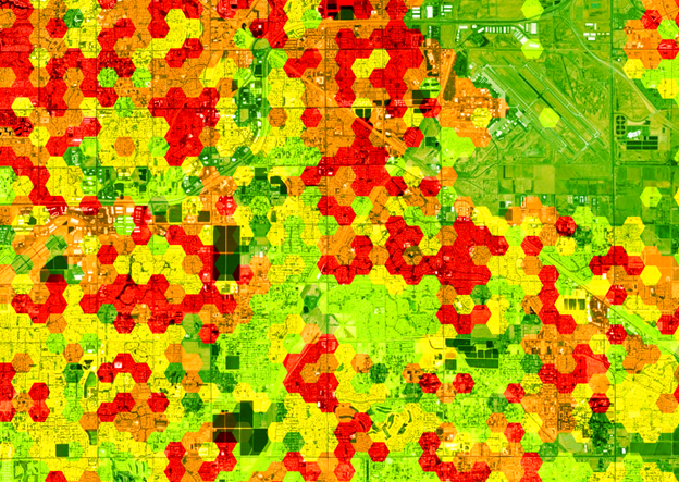 Hexgrid symbolizing candidate locations for schools in red.