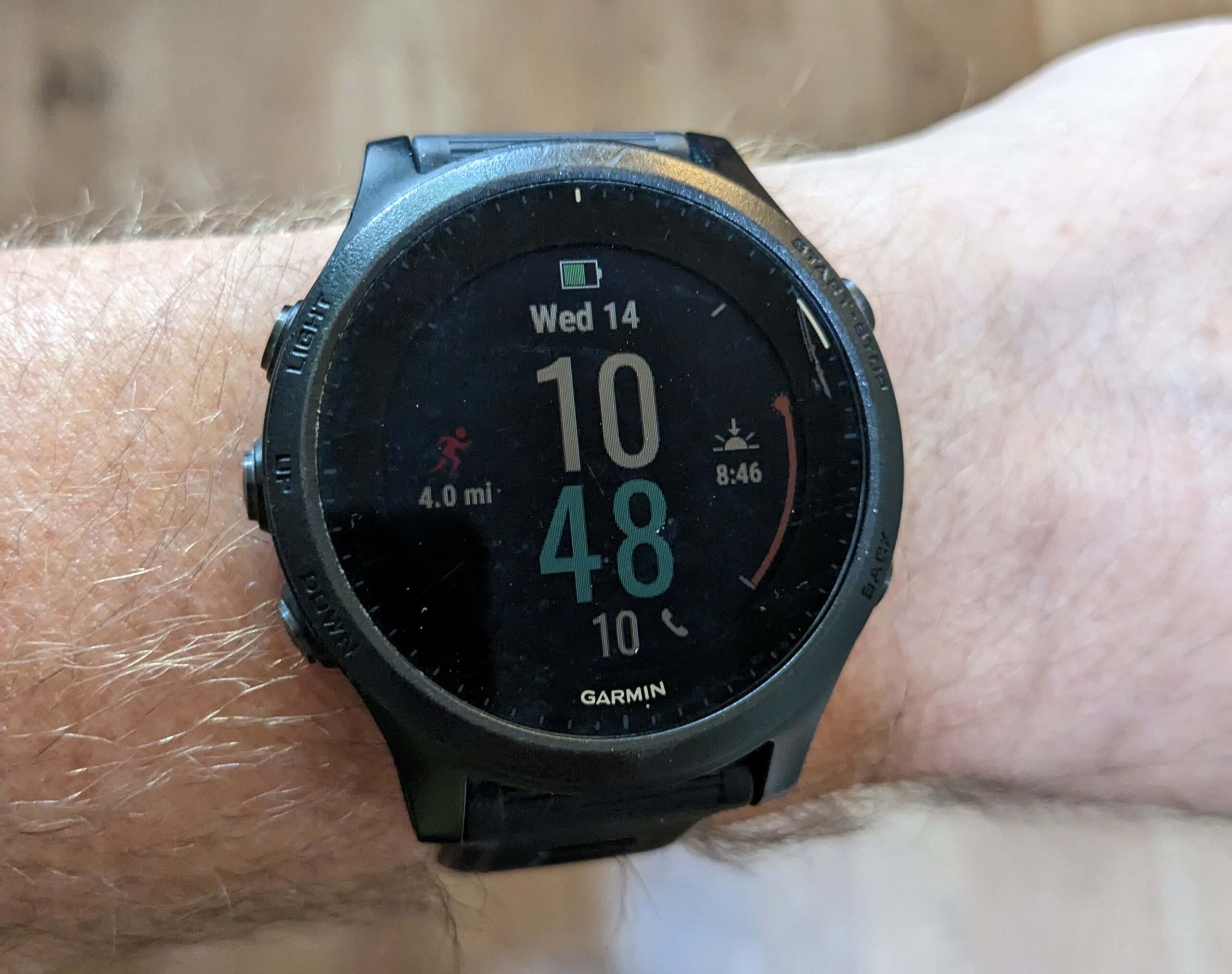 close up of GPS watch on an unusually handsome wrist