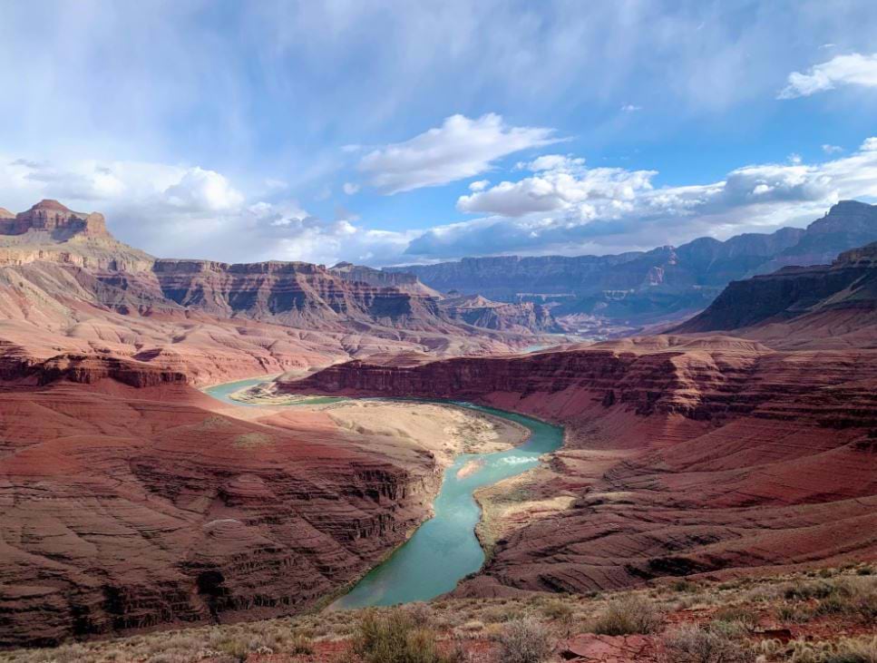 A landscape view of the Colorado River flowing through the Grand Canyon