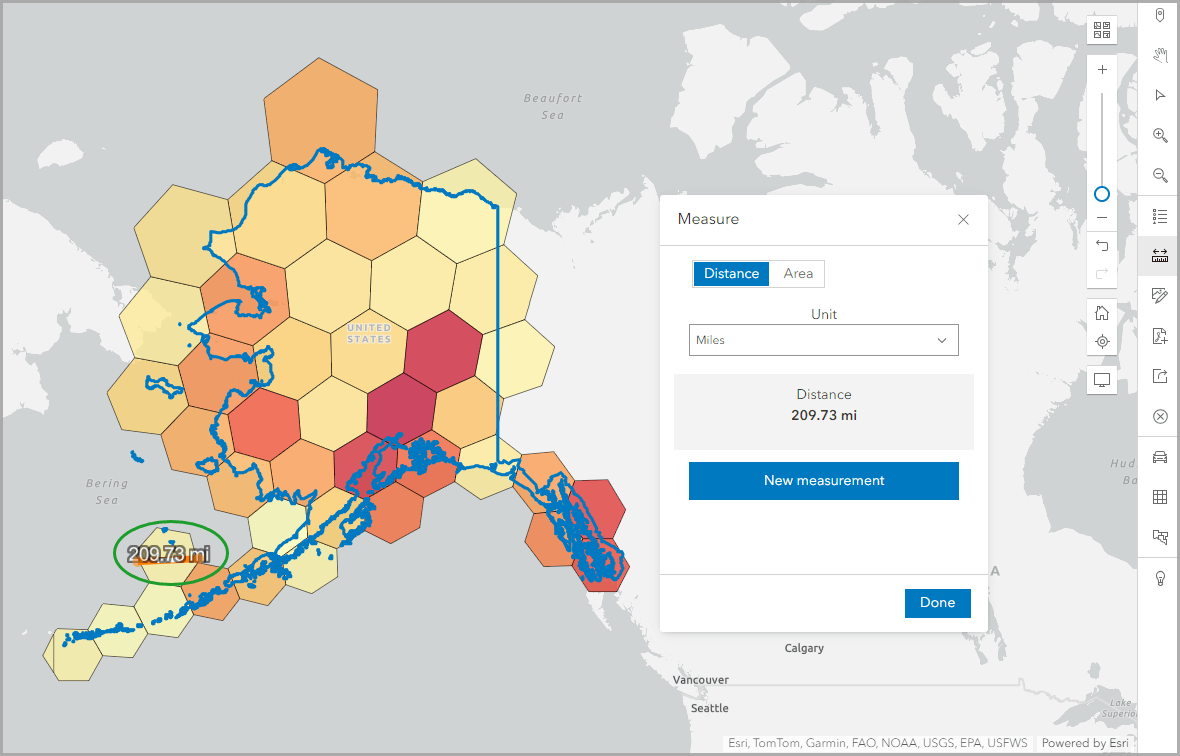 Measure the distance of the southernmost hexagon in Alaska