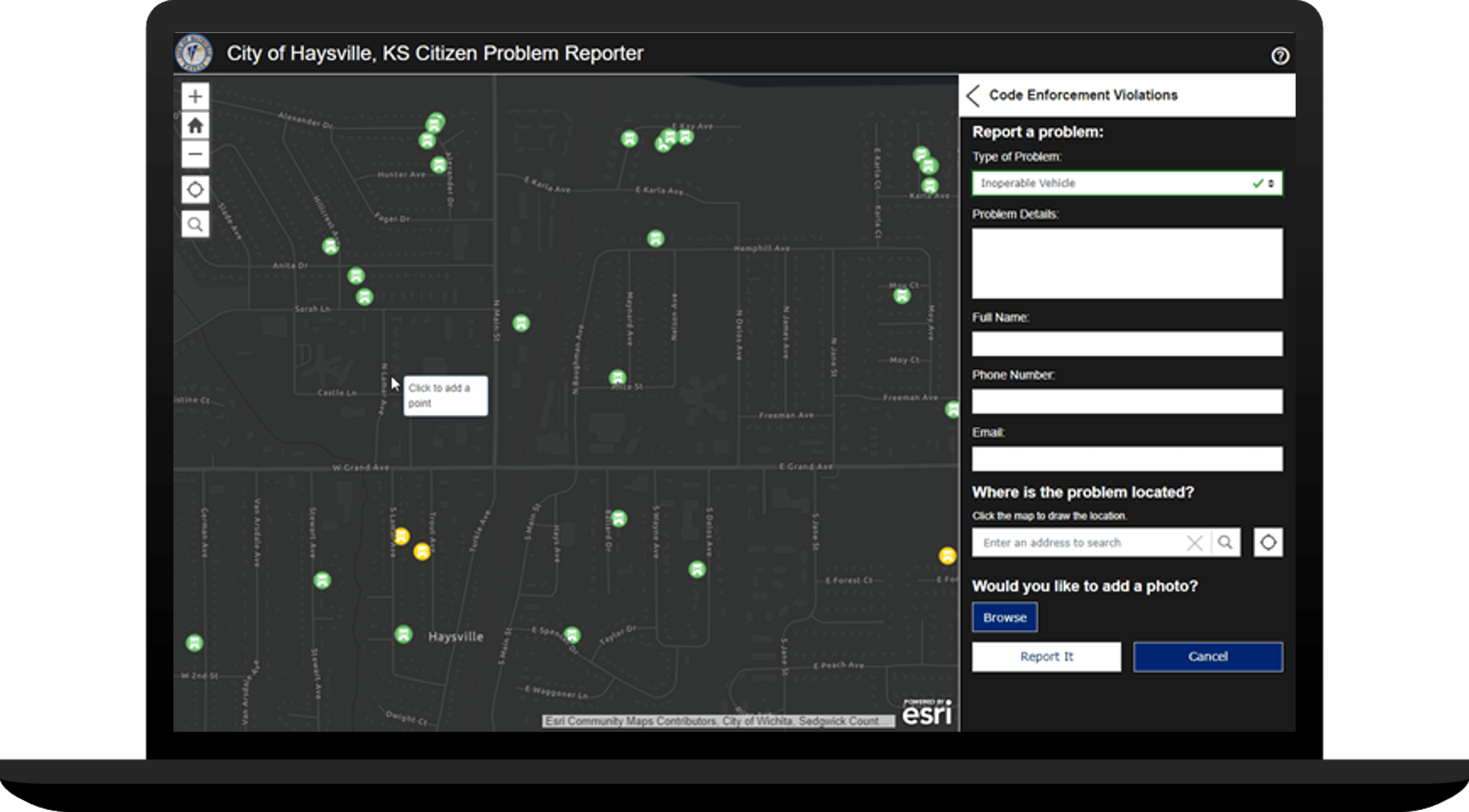 Laptop showing an interactive map with a dark theme and green and yellow points, along with a partially completed form on the right set with Inoperable vehicle selected.