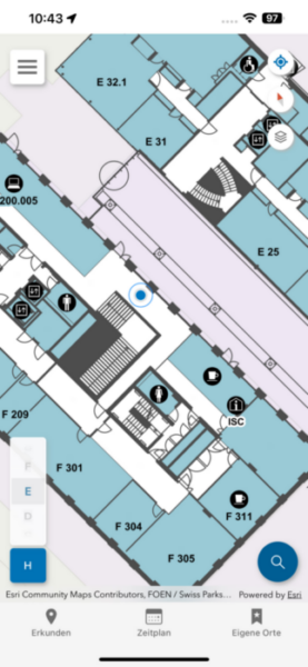 Indoor map (floorplan) of a building with small color palette and a blue dot
