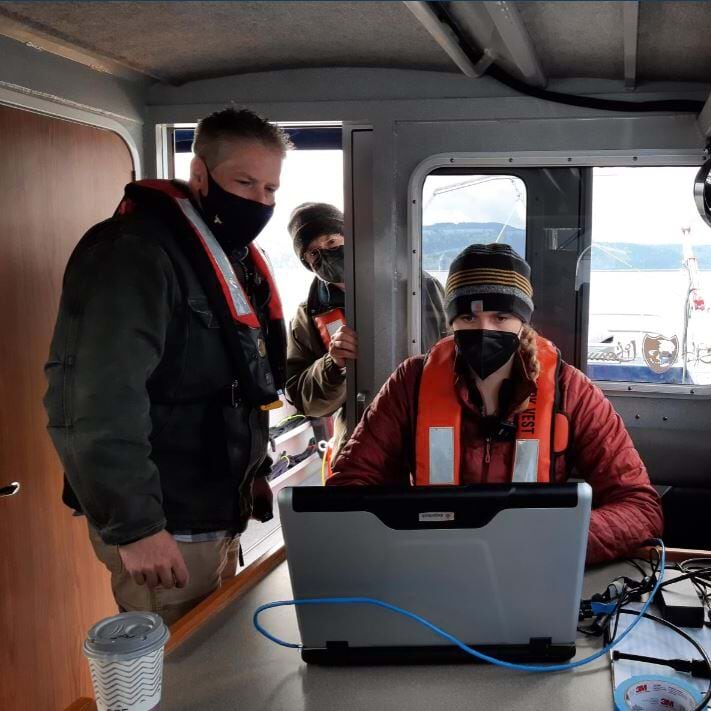 Students gather sonar data during their field work off the coast of Washington State