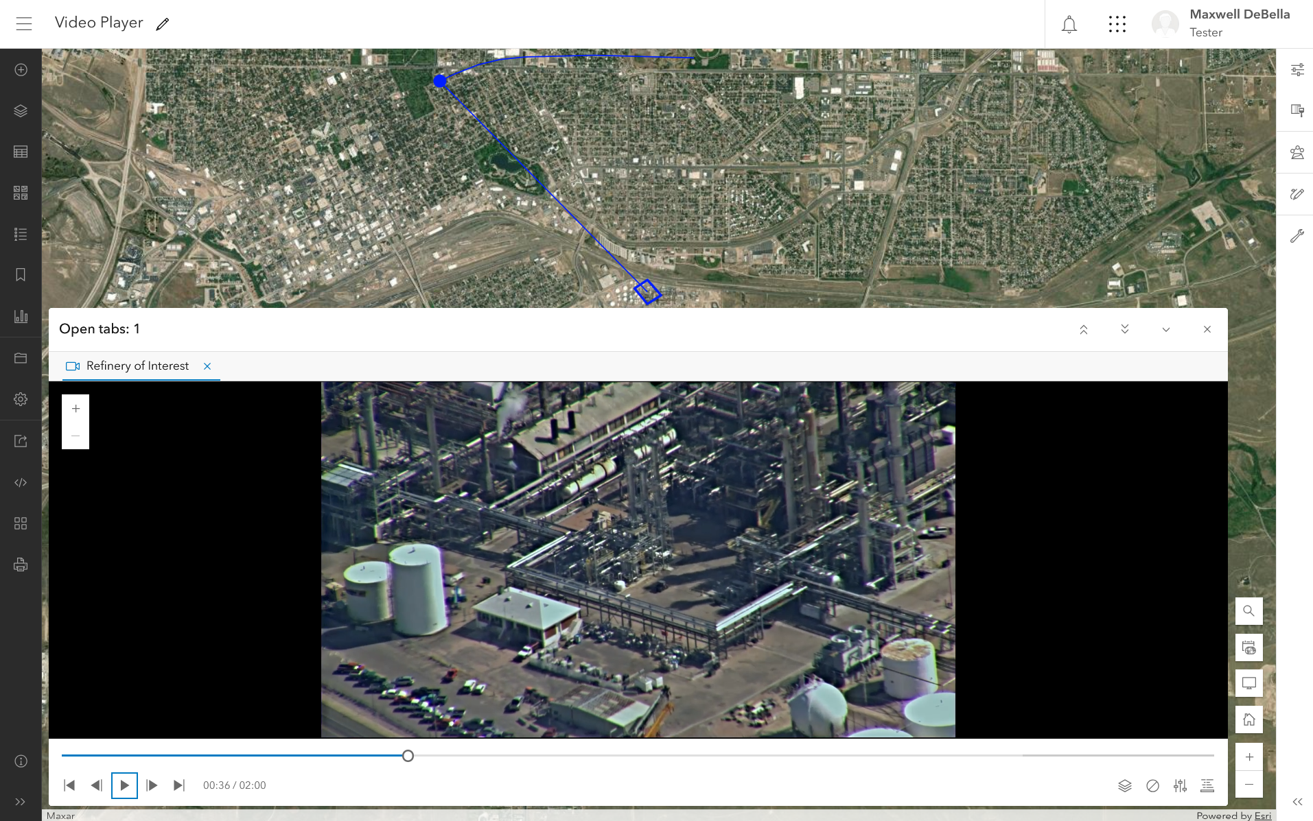 Image showing the "Video Player" feature with an open tab of video showing of a manufacturing facility.