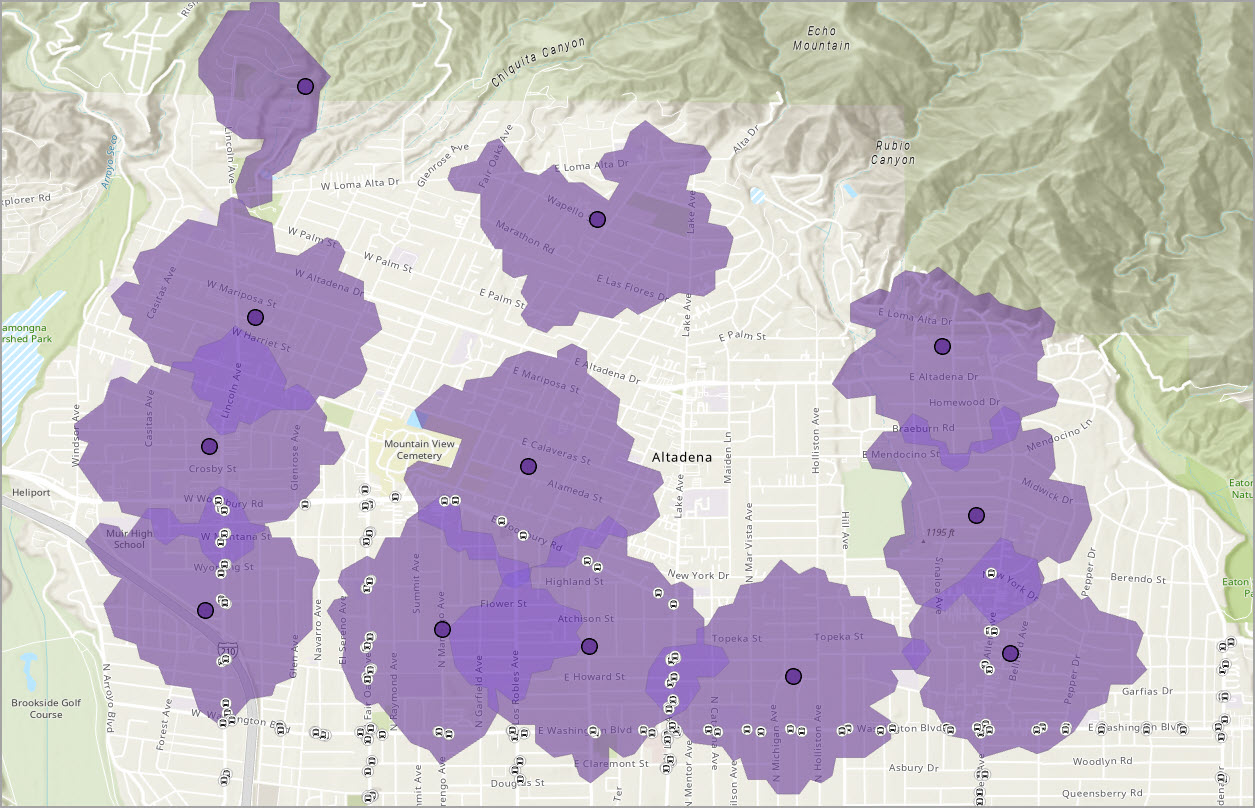 Walk-time catchment zones and transit stops.