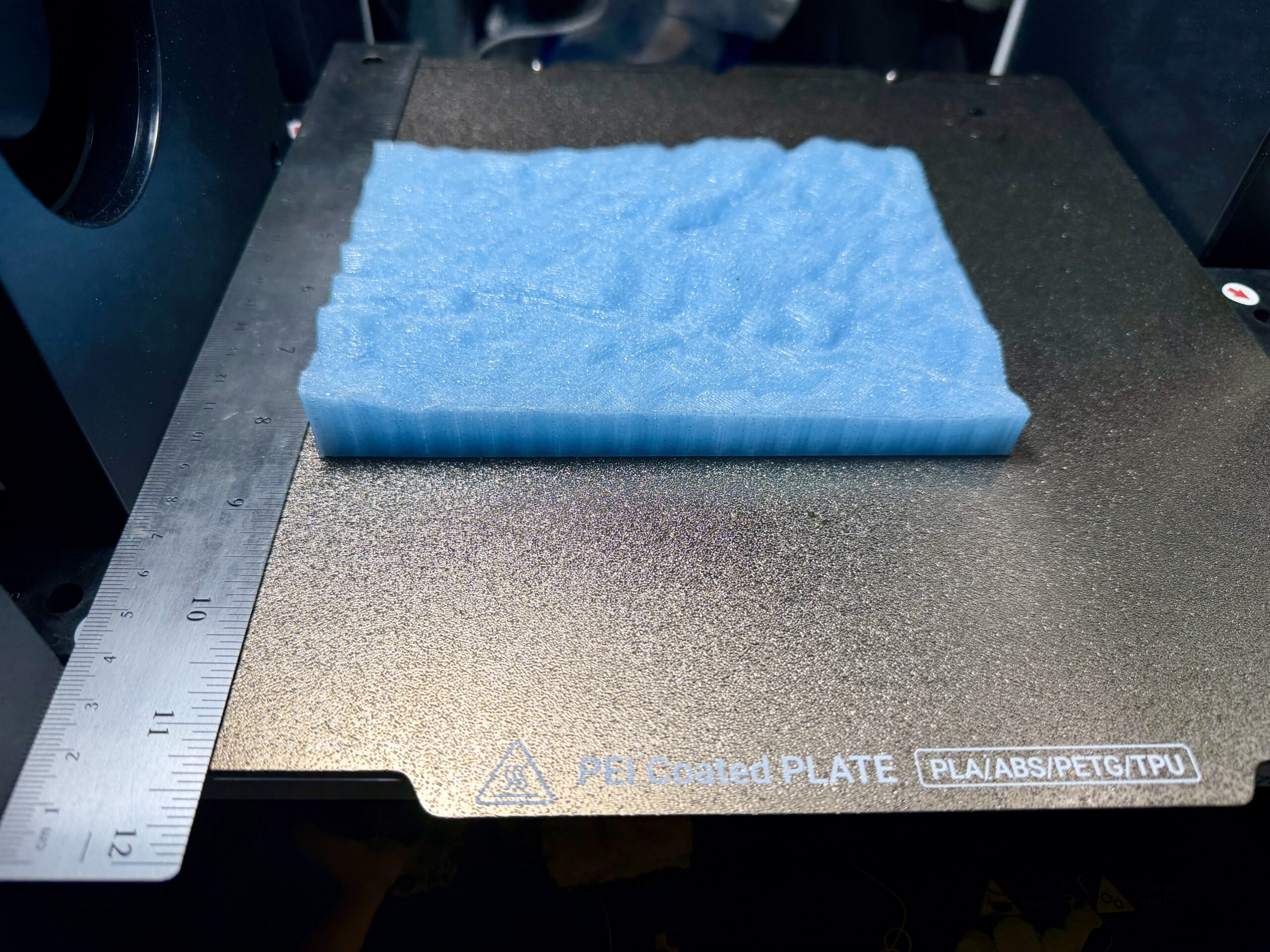 3D Print of trippy bathymetry slices in sparkly blue PETG