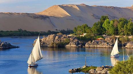Two boats sailing on the Nile river