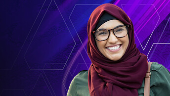 A smiling person in a green top and dark red hijab with an abstract background of swirling purple color 