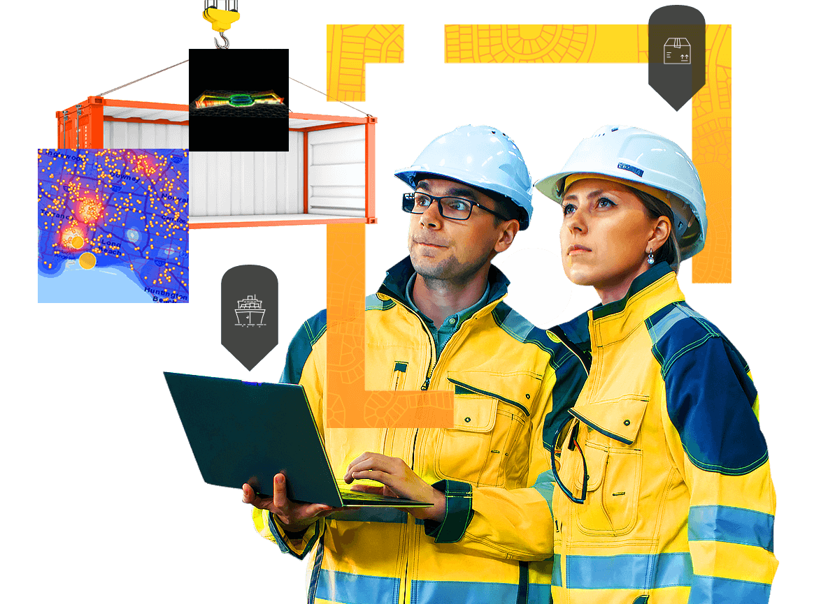 Man and woman in hardhats view logistics information on a laptop