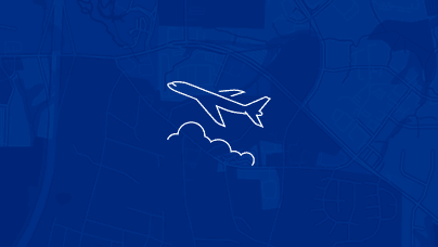 A simple line icon of the side view of an airplane over clouds in white lines on a blue background