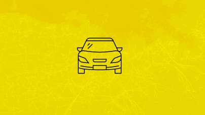 A simple line icon of the front view of a passenger vehicle in black lines on a yellow background