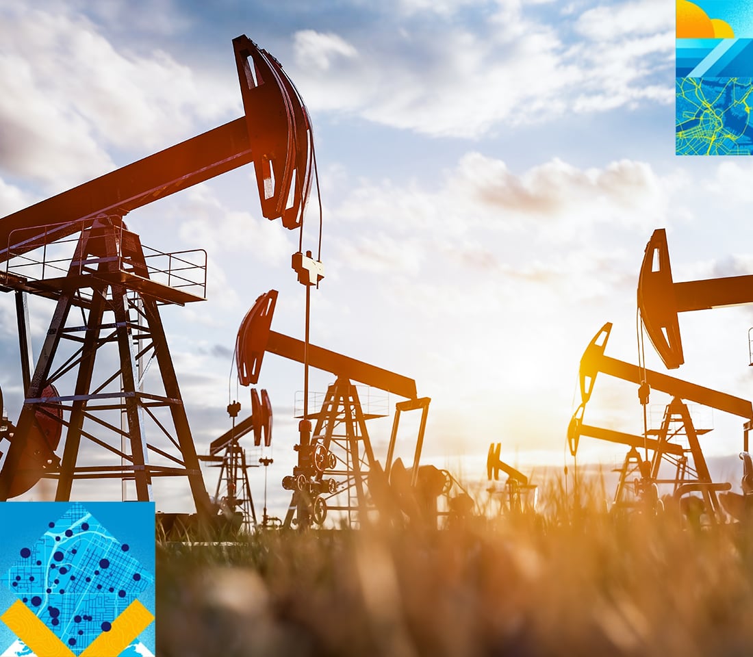 Two presenters onstage with a 3D model of a baseball stadium projected behind them