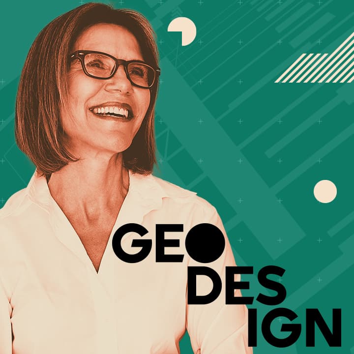 Smiling person with short hair and glasses against a green background with the word Geodesign