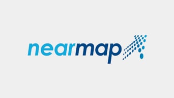 Nearmap logo, with the first part of the word in turquoise and the last part in dark blue; to the right, an upward-pointing arrow made of light and dark blue dots
