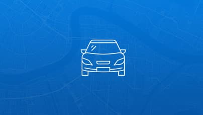 A simple line icon of the front view of a passenger vehicle in white lines on a blue background