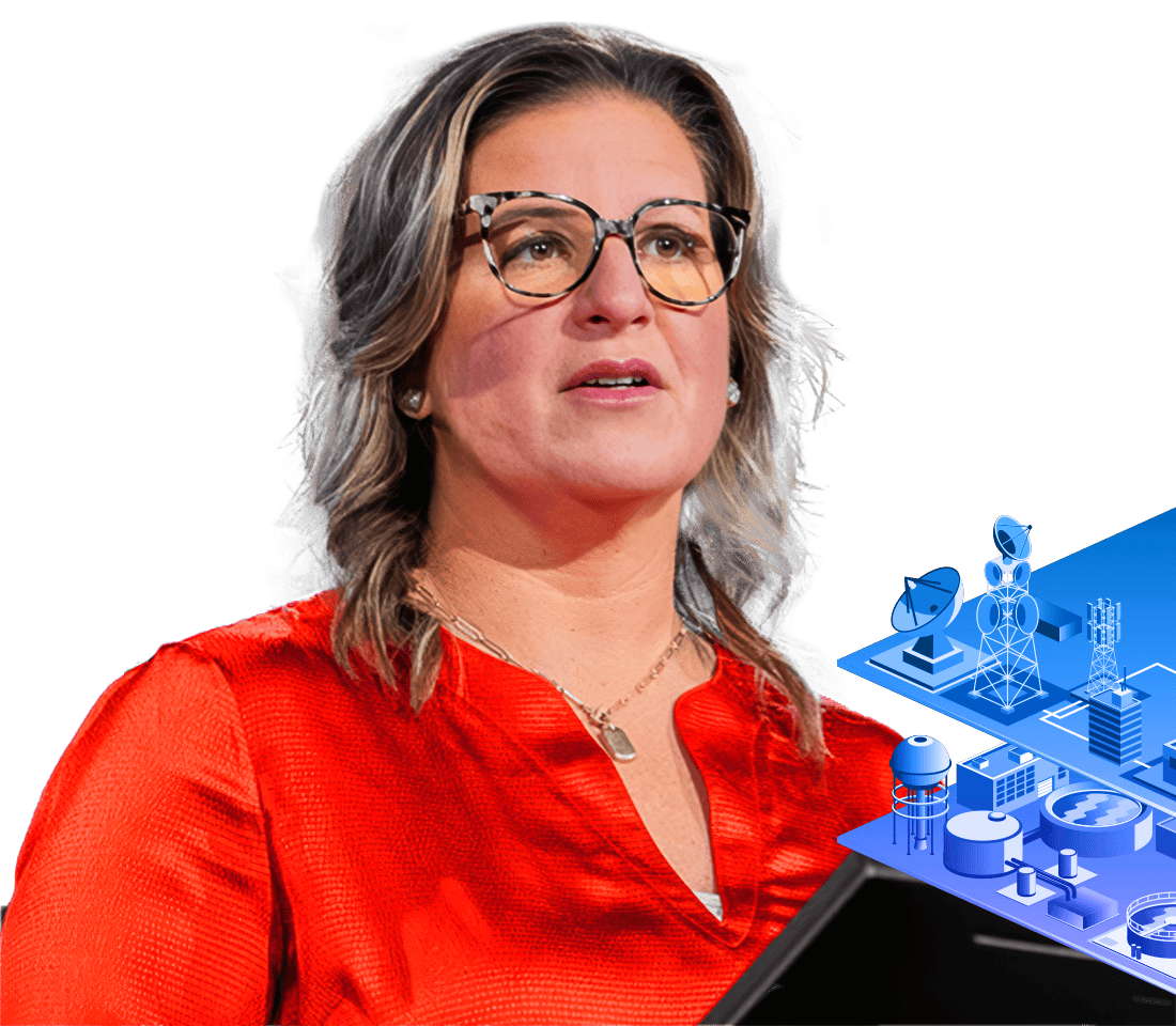 Portrait of an event presenter wearing glasses and a red blouse