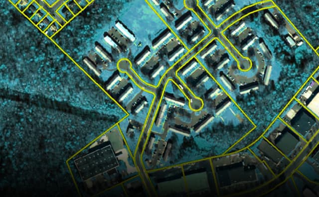 Blue imagery of neighborhood streets and cul-de-sacs outlined yellow