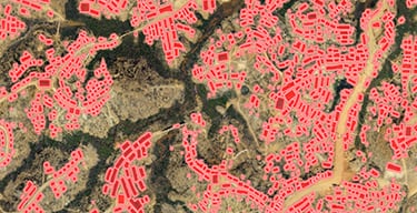 Map overlaid with small data points indicated by red rectangular and irregular shapes