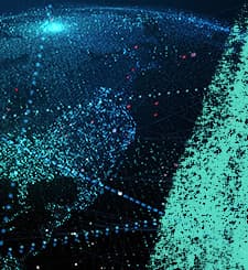 Digital visualization of Earth with glowing blue and teal dots forming a network across the globe suggesting data or connectivity.
