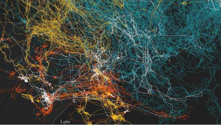 An abstract visualization shows dense, multicolored lines weaving across a dark background