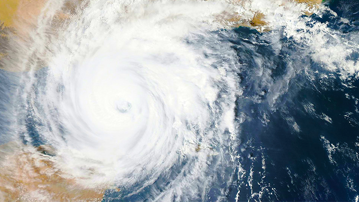 Aerial view of a hurricane approaching land