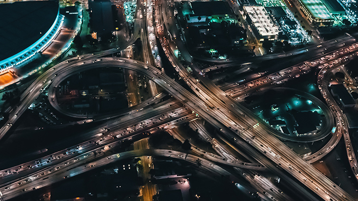 Aerial view of pollution-contributing freeways at night