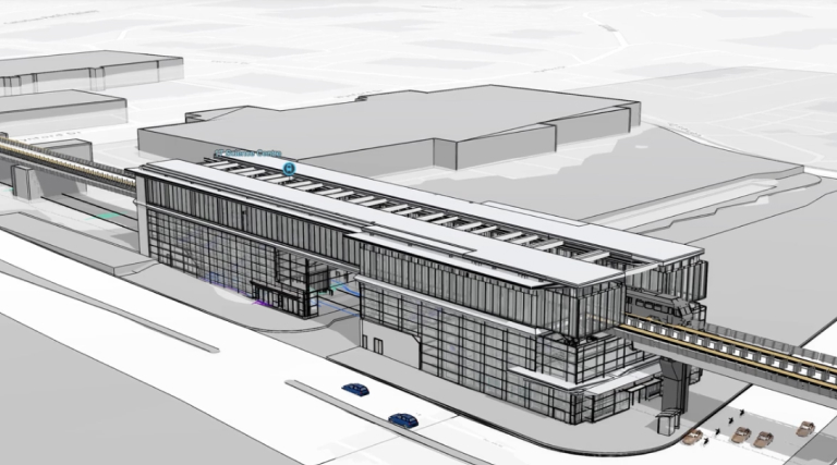 Digitales Modell eines neuen Personenbahnhofs in Schwarz und Weiß mit darüber angezeigter Wiedergabeschaltfläche