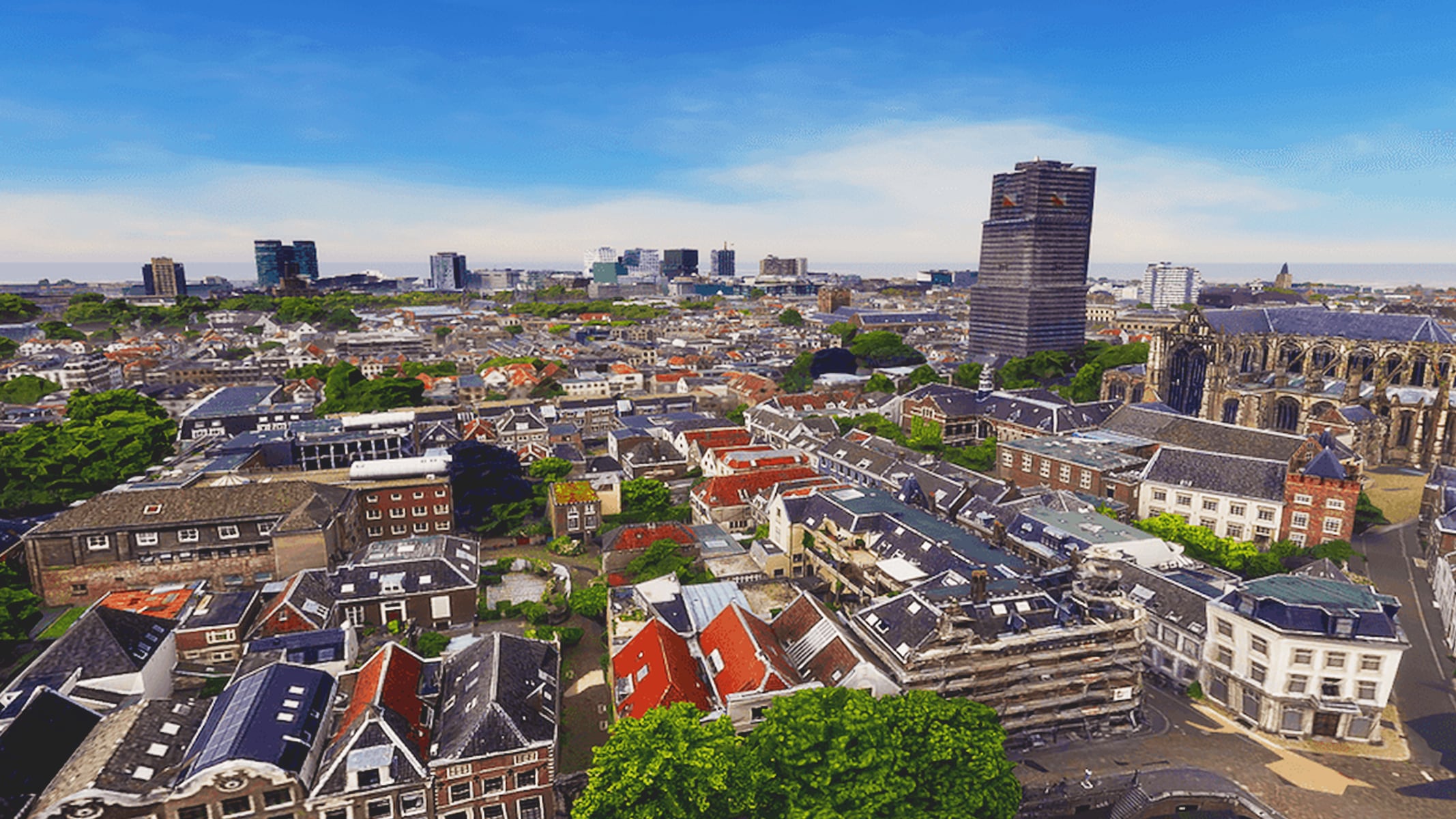 Aerial view of a city with both old and new buildings