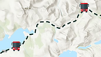 A map of mountainous terrain, with a bus or truck and a dotted line indicating its path