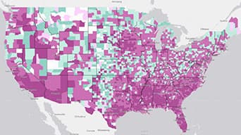 Blue and purple dashboard map of trends in U.S Counties