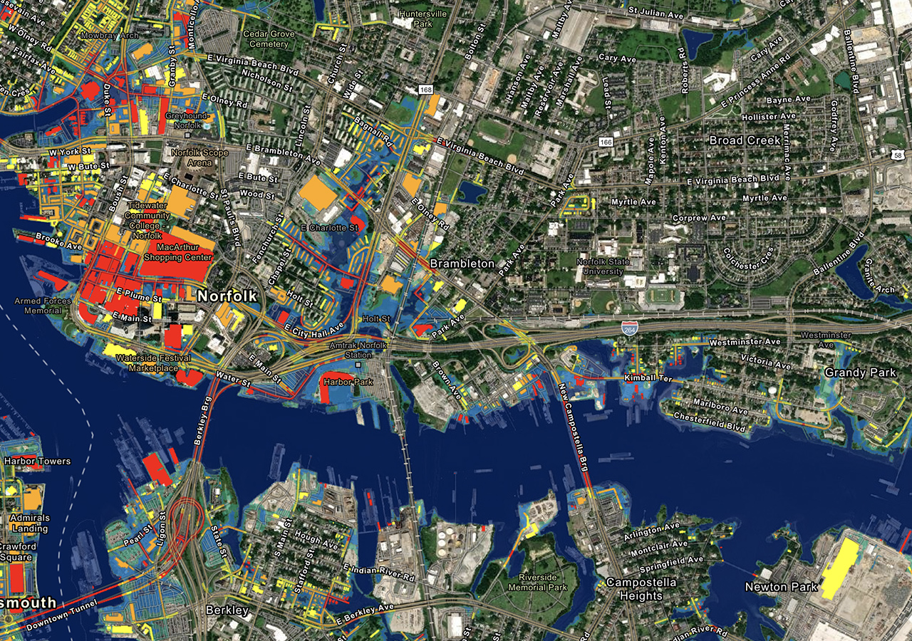 Un colorido mapa de Norfolk (VA) con edificios y carreteras adyacentes al agua sombreados en rojo y amarillo.