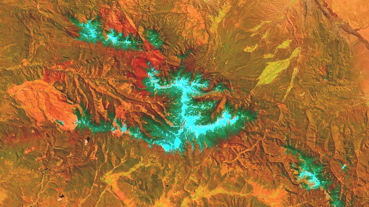 Satellite imagery displays terrain data in a red, orange, and blue gradient
