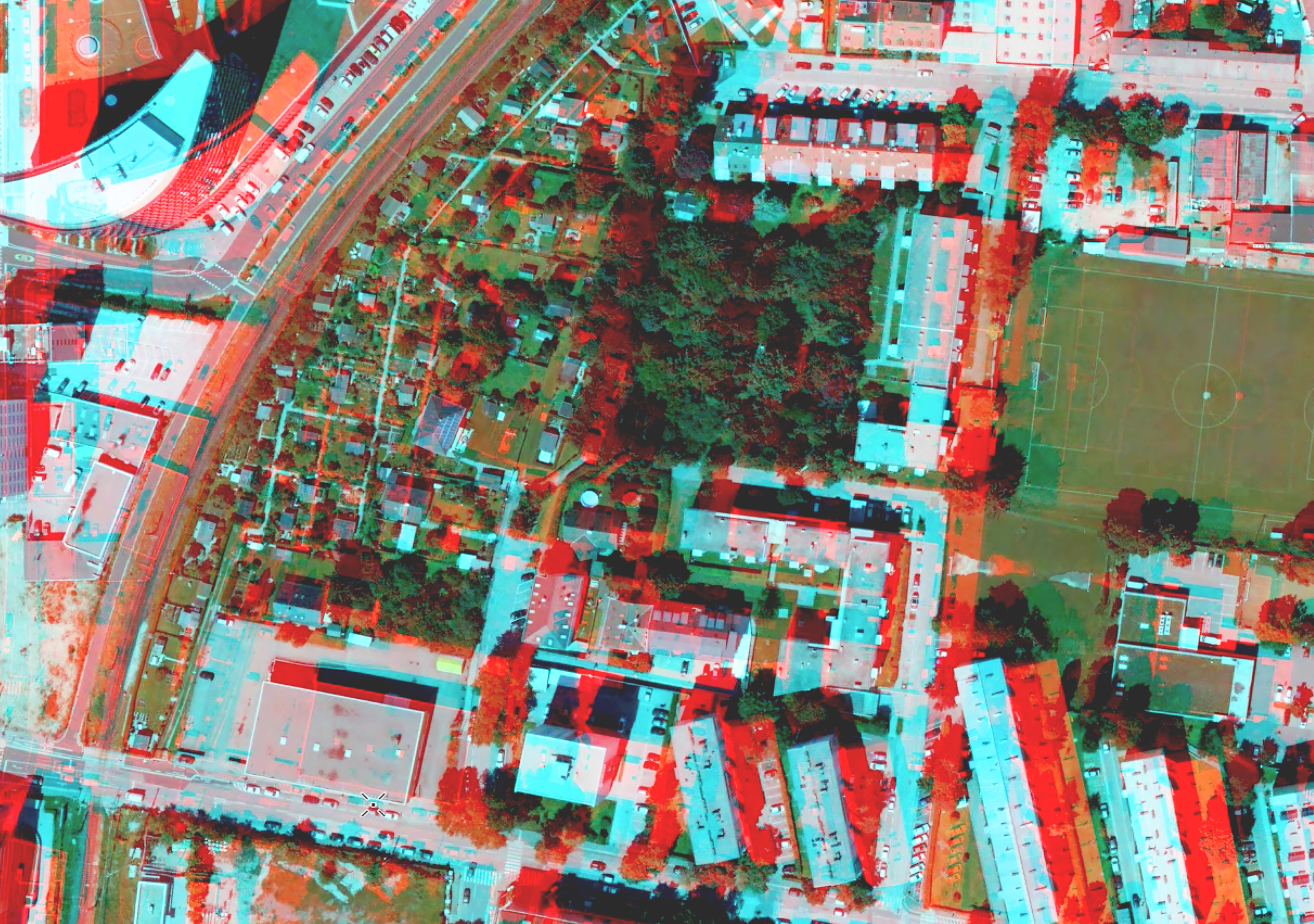 A stereo map of a dense residential area shows a red overlay where features can be shown in 3D