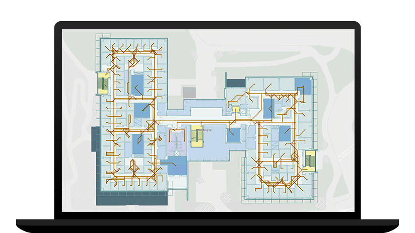 Laptop showing an indoor map of a building with exit routes highlighted in yellow and brown