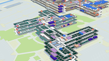 A digital image of multiple large buildings representing an indoor map with asset data and locations
