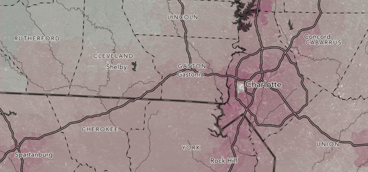 A GIF showing a map of Charlotte, North Carolina, shaded in pale tones of purple and blue that become more saturated