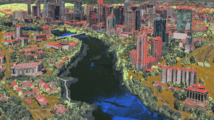 A 3D representation of a city with green and red points overlaid, buildings, and a blue body of water