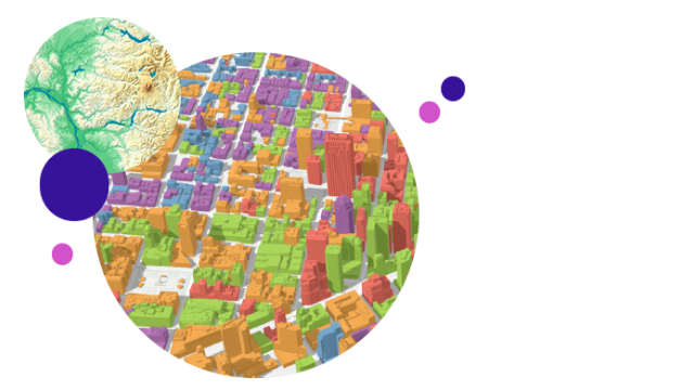 A digital model of an urban area with multicolored, 3D buildings overlaid with a relief map of foothills, a valley, and rivers